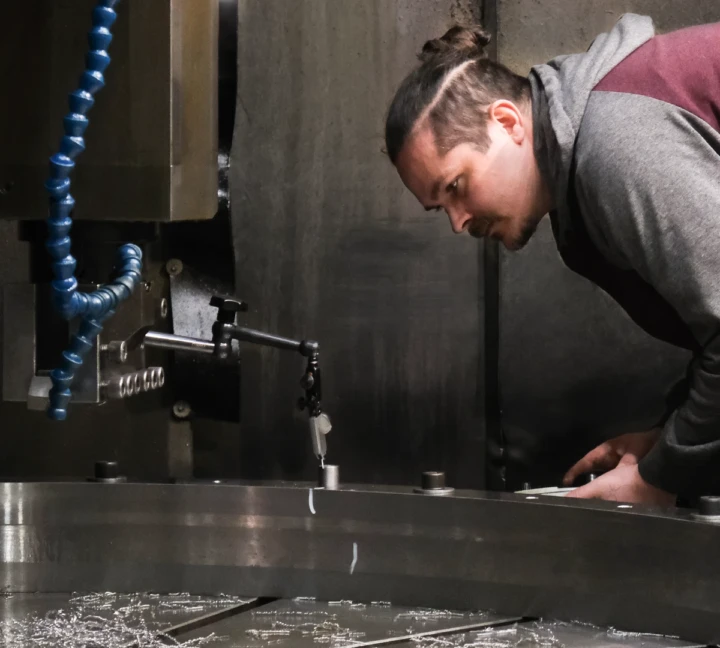 ITAMCO employee checking tolerances